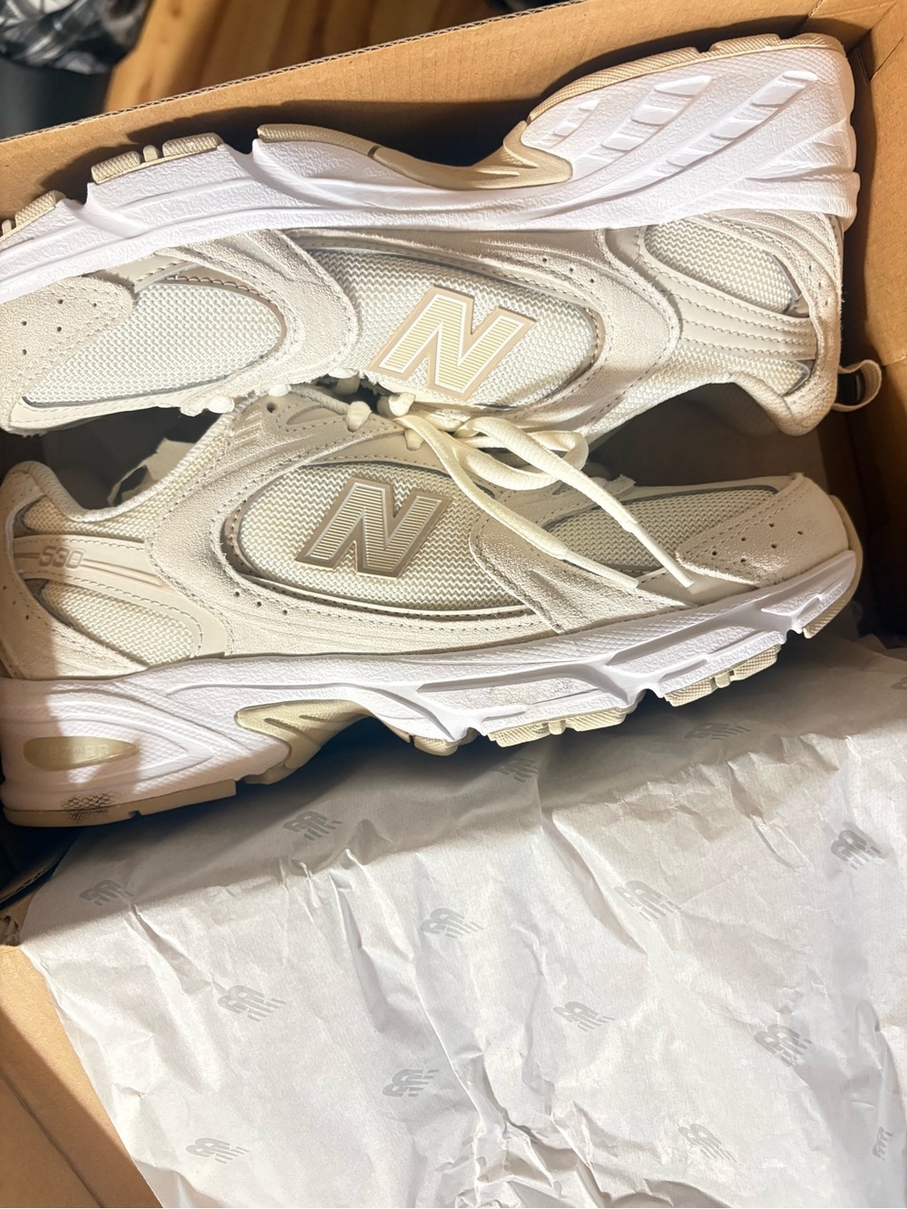 New Balance Women's Sneakers in Cream and White with Subtle Gold Accents